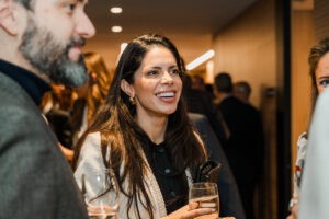 Make Your Corporate Event in Madrid Stand Out – Step-by-Step Checklist - nicoletalupuagency Networking moment between international guests at a corporate conference
