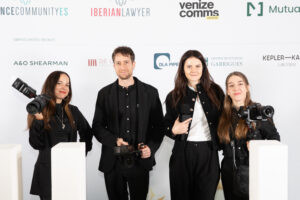 Professional photography and videography team in Madrid with cameras and audio equipment at a corporate event.