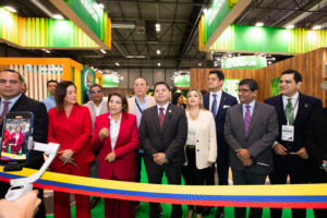 International corporate delegation visiting an exhibition stand at IFEMA Madrid.