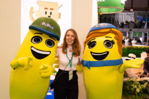 Brand activation with mascots and event staff at an exhibition stand in IFEMA Madrid.